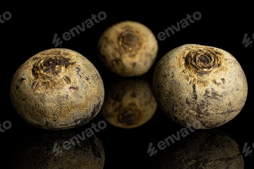 Preview: Group Of Three Whole Raw Red Beetroot Isolated On Black Glass