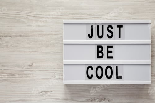 Preview: Modern Board With Text 'Just Be Cool' On A White Wooden Table, Top View. From Above, Flat Lay