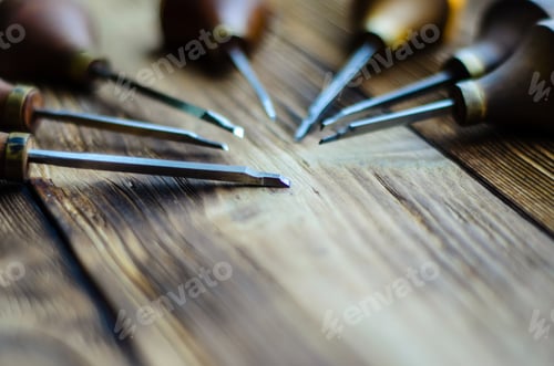 Preview: Different Gravers For Jewelry On A Wooden Background