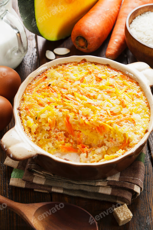 Preview: Pumpkin Casserole With Carrots And Rice On The Table