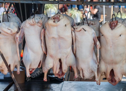 Preview: Street Food. Fresh Raw Ducks Are Ready For Smoking Or Baking In The Oven On Iron Hooks. Selective
