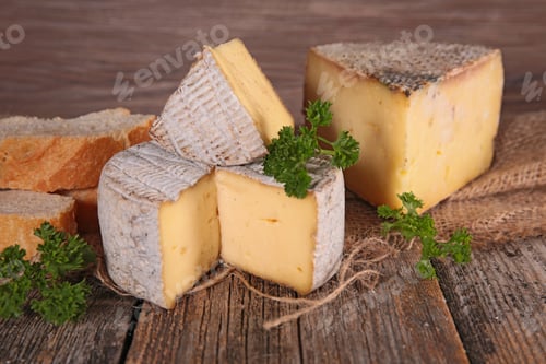Preview: Various Cheese On Wood Background