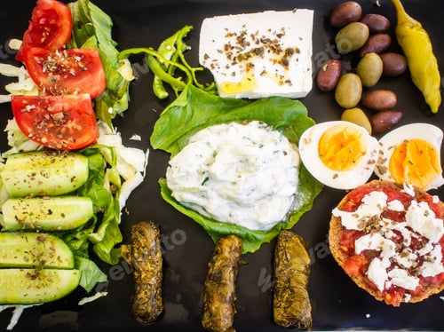 Preview: Crete Plate - Fresh Greek Salad, Feta Cheese, Dolmades, Tomatoes, Lettuce, Boiled Egg, Black And