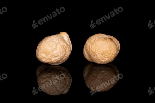 Preview: Group Of Two Whole Fresh Tan Chickpea Isolated On Black Glass