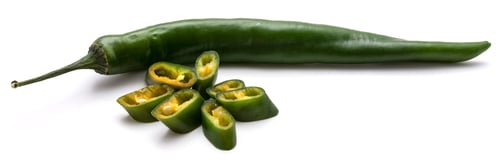 Preview: One Whole Green Chili Pepper And Slices Folded As Flower Isolated On White Background