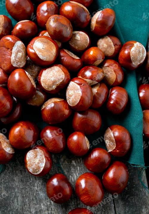 Preview: Chestnuts On Wooden Surface