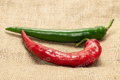 Preview: Group Of Two Whole Fresh Hot Pepper On Jute Cloth