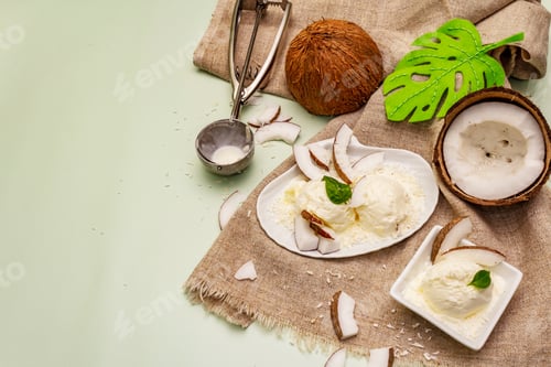 Preview: Lactose Free Coconut Ice Cream. Special Spoon, Halves Of Fruit, Flakes. Vegan Dessert Concept