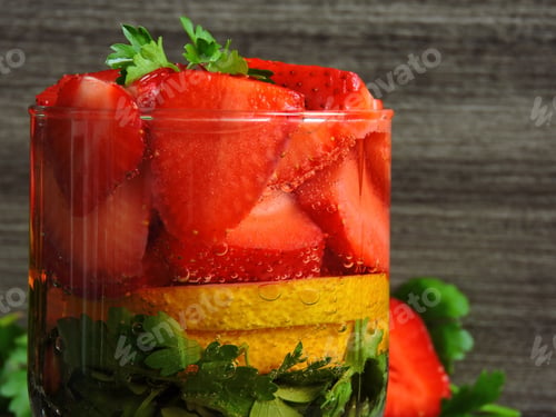 Preview: Detox Water With Strawberries And Lemon. Macro. Lemon Parsley Strawberry. Copy Space.