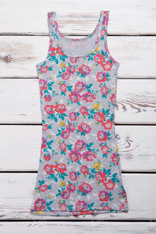 Preview: Summer T-Shirt With Floral Print On A Wooden Background.