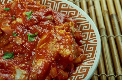 Preview: Bourdeto - Dish From Corfu. Fish Cooked In Tomato Sauce With Onion, Garlic And Red Spicy Pepper.