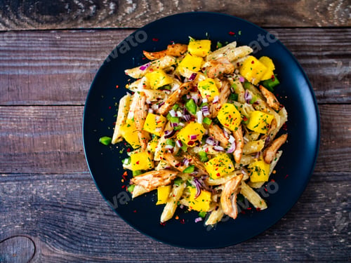 Preview: Chicken Ragout With Penne On Wooden Table
