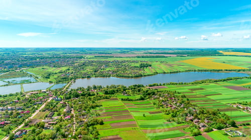 Preview: Top View Of Rural Landscape On Sunny Spring Day. House And Green Field. Drone Photography