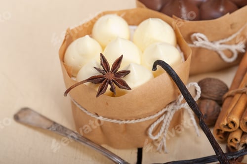 Preview: Fresh Baked Chocolate Vanilla And Spices Cream Cake Dessert Over Rustic Wood Table