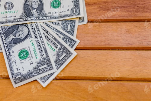 Preview: Heap Of One Dollar Banknotes On Wooden Background. Top View
