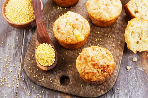 Preview: Unsweetened Millet Muffins On A Wooden Table