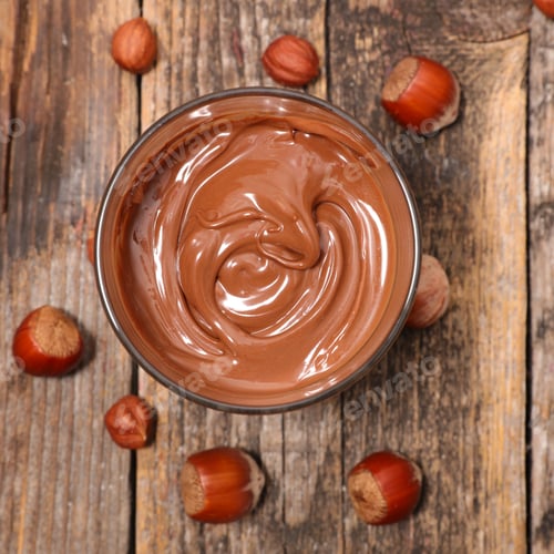 Hazelnut Spread in Glass Bowl on Rustic Wood