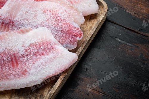 Preview: Frozen Fish Fillet, On Old Wooden Table, Top View With Copy Space For Text
