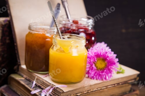 Preview: Set Of Jam And Honey In Glass Container With Flower And Book