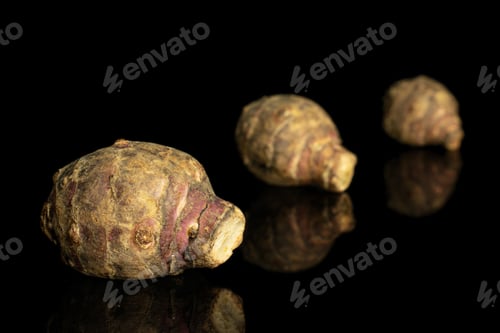 Preview: Group Of Three Whole Fresh Brown Jerusalem Artichoke Isolated On Black Glass
