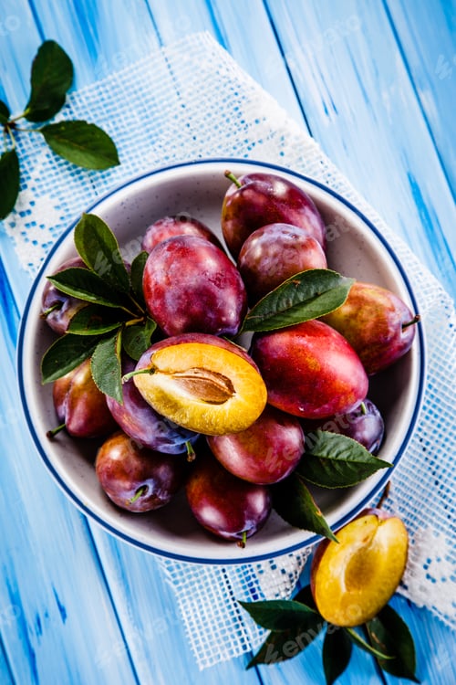 Preview: Plums On Wooden Table