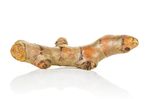 Preview: One Whole Fresh Bright Turmeric Rhizome Isolated On White Background