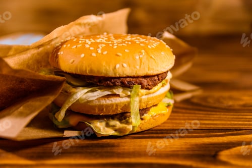 Preview: Fresh Hamburger On A Rustic Wooden Table
