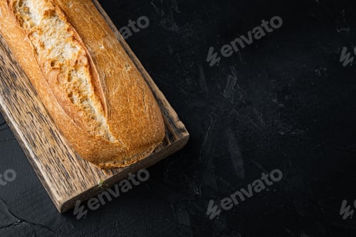 Preview: Crunchy French Baguette, On Black Background With Copy Space For Text
