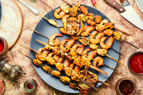 Preview: Delicious Roasted Shrimps And Mussels On Wooden Skewers