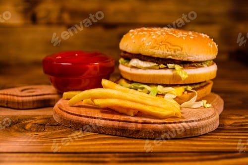 Preview: Hamburger And Sauce On Rustic Wooden Table