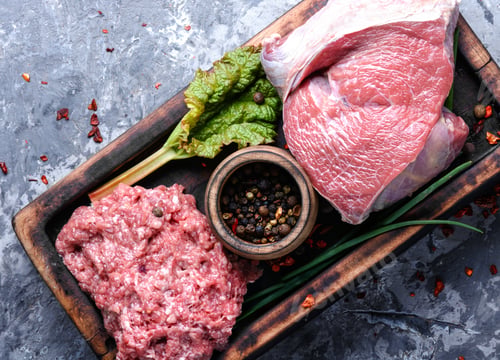 Preview: Fresh Raw Beef On Cutting Board And Peppercorn