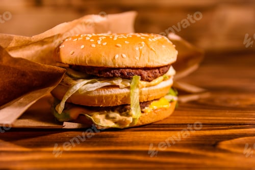 Preview: Fresh Hamburger On A Rustic Wooden Table