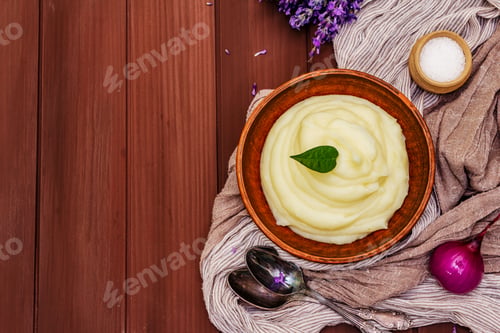 Preview: Mashed Potatoes In A Clay Bowl. Cutlery, Sea Salt, Fragrant Leaf, Fresh Bouquet Of Lavender. Wooden