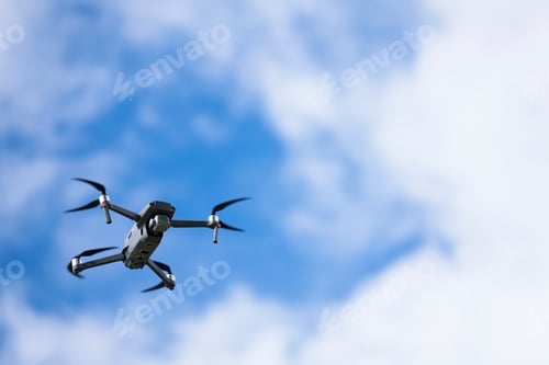 Preview: Drone Flying Quadcopter In Blue Sky Which Requires Registration