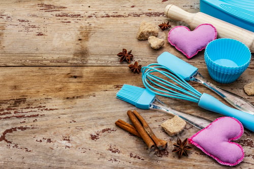 Preview: Valentines Day Baking Background. Silicone Molds For Cupcakes, Spices, Sugar, Whisk, Spatula
