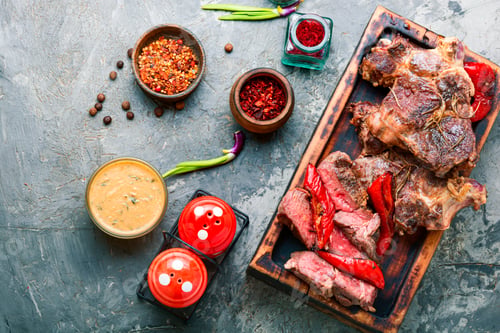 Preview: Juicy Medium Beef Steak Slices On Wooden Kitchen Board