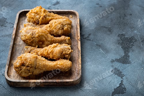 Preview: Fried Crispy Chicken Legs, Drumstick Parts On Grey Background, With Copy Space.