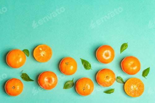 Preview: Ripe Juicy Tangerines And Fresh Leaves. Sunny Summer Turquoise Background, Top View