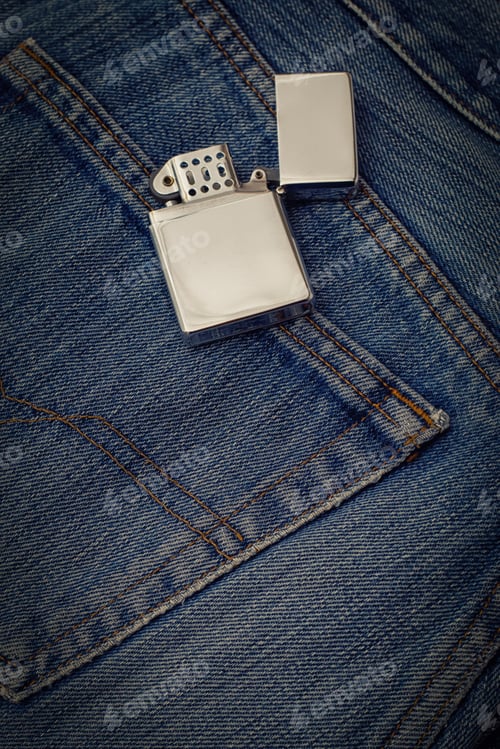 Preview: Pocket Of Jeans With A Cigarette-Lighter.