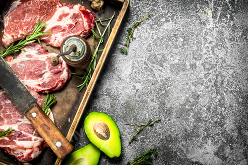 Preview: Raw Beef With Herbs And Spices. On Rustic Background.