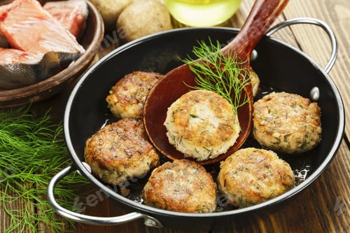 Preview: Fishburgers With Potato And Herbs On The Frying Pan