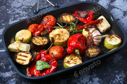 Preview: Grilled Vegetables In A Frying Pan On A Blue Concrete Background