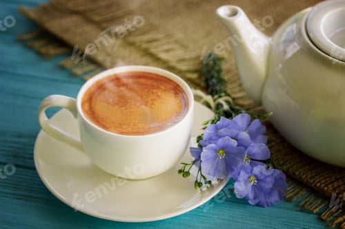 Preview: Coffee Mug With Blue Flowers And Notes Good Morning On Blue Rustic Table From Above, Breakfast
