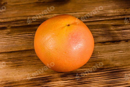 Preview: Fresh Ripe Grapefruit On Rustic Wooden Table
