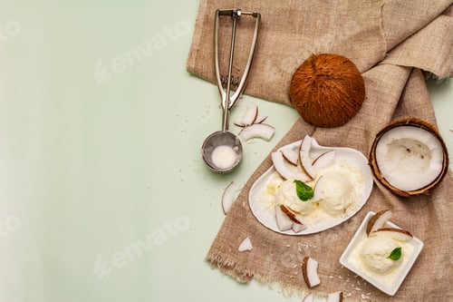Preview: Lactose Free Coconut Ice Cream. Special Spoon, Halves Of Fruit, Flakes. Vegan Dessert Concept