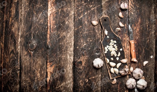Preview: Garlic Preparation on Rustic Wooden Background