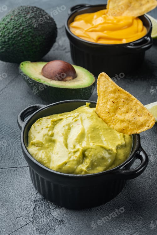 Preview: Traditional Mexican Homemade Guacamole Sauce In Bowl, On Gray Background