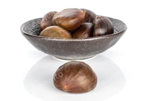 Preview: Group Of Seven Whole Edible Brown Chestnut In Glazed Bowl Isolated On White Background