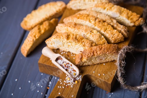 Preview: Crispy Salted Bread, Scoop With Salt Crystalls On Wooden Table. Salty Junk, Unhealthy Snacks, Fast