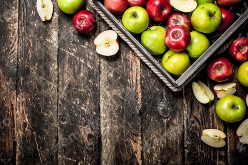 Preview: Box With Fresh Red And Green Apples. On A Wooden Background.